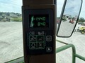  John Deere 4995 Self-Propelled Windrowers and Swather