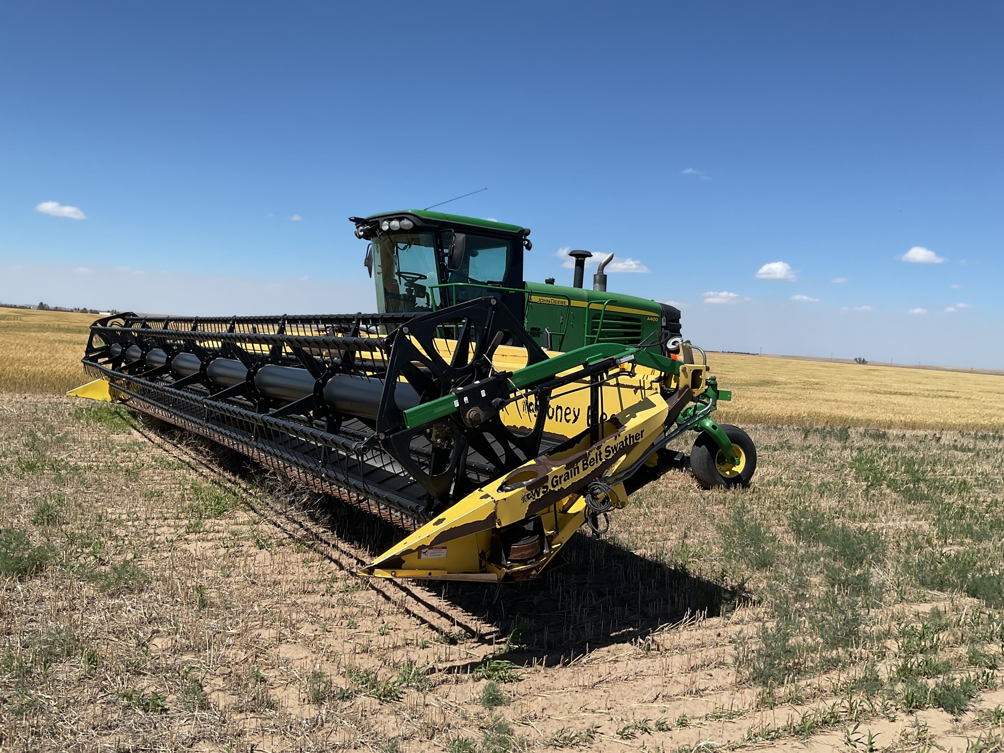 2010 John Deere A400 Self-Propelled Windrowers and Swather