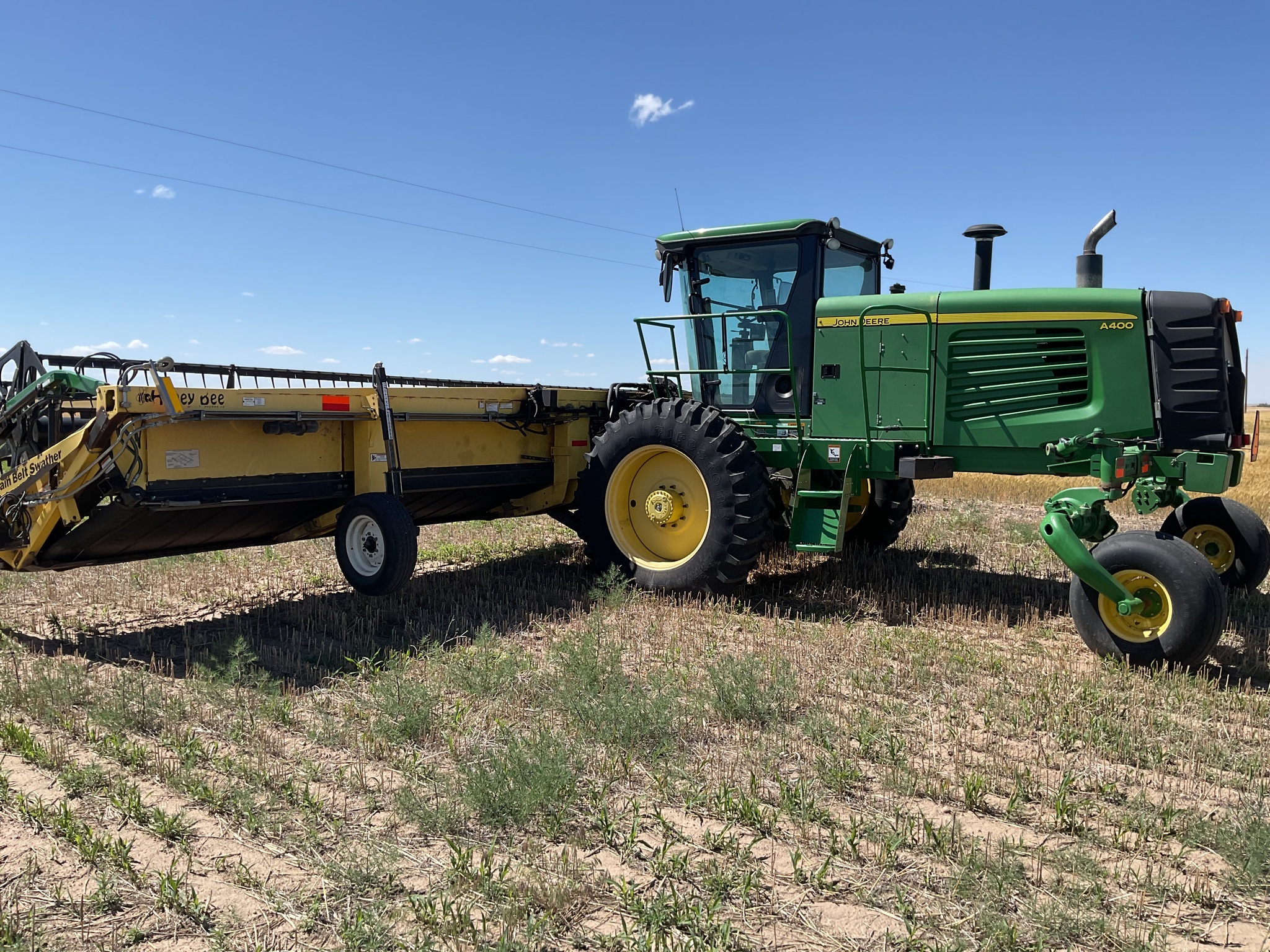 2010 John Deere A400 Self-Propelled Windrowers and Swather