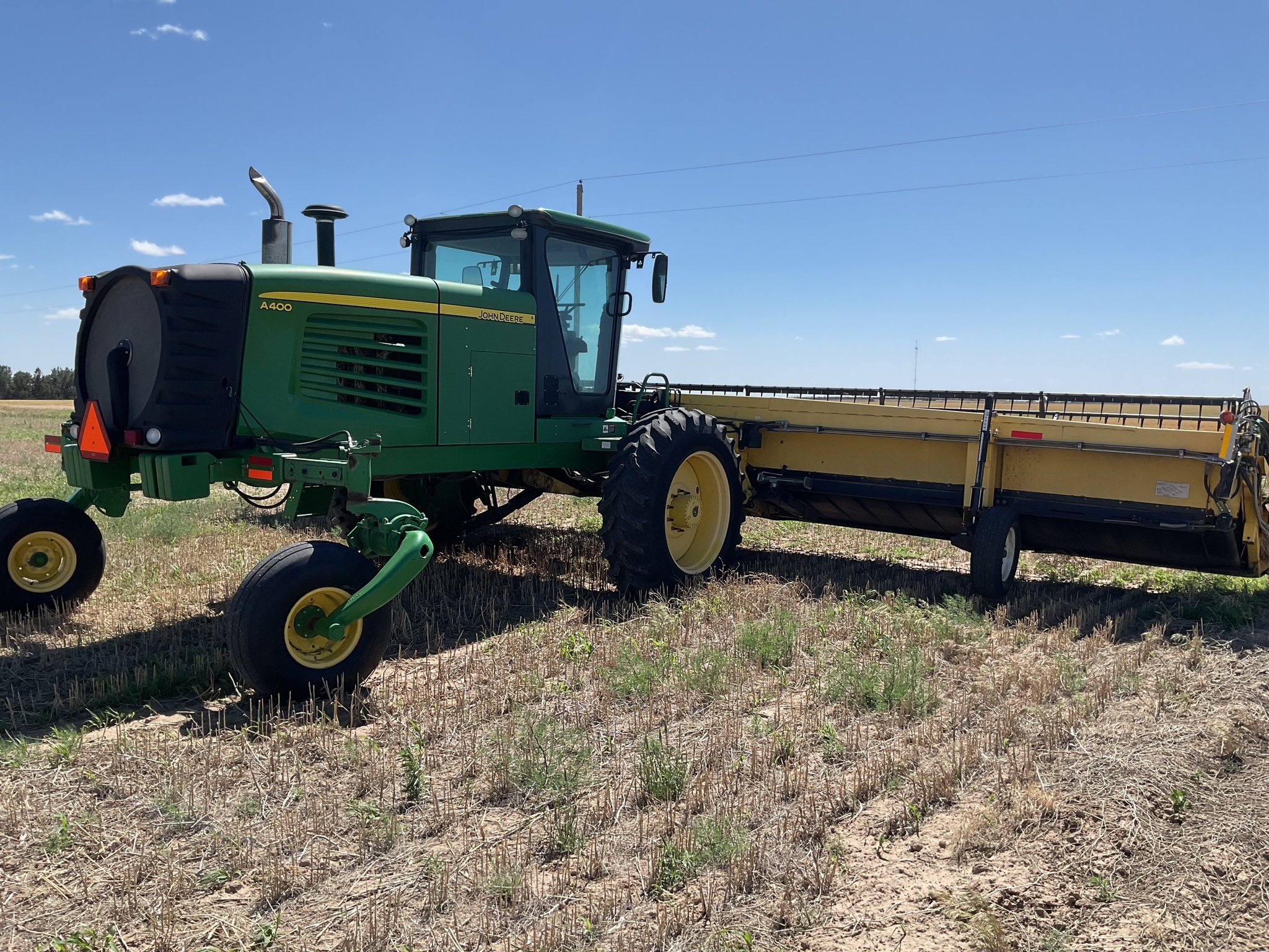2010 John Deere A400 Self-Propelled Windrowers and Swather