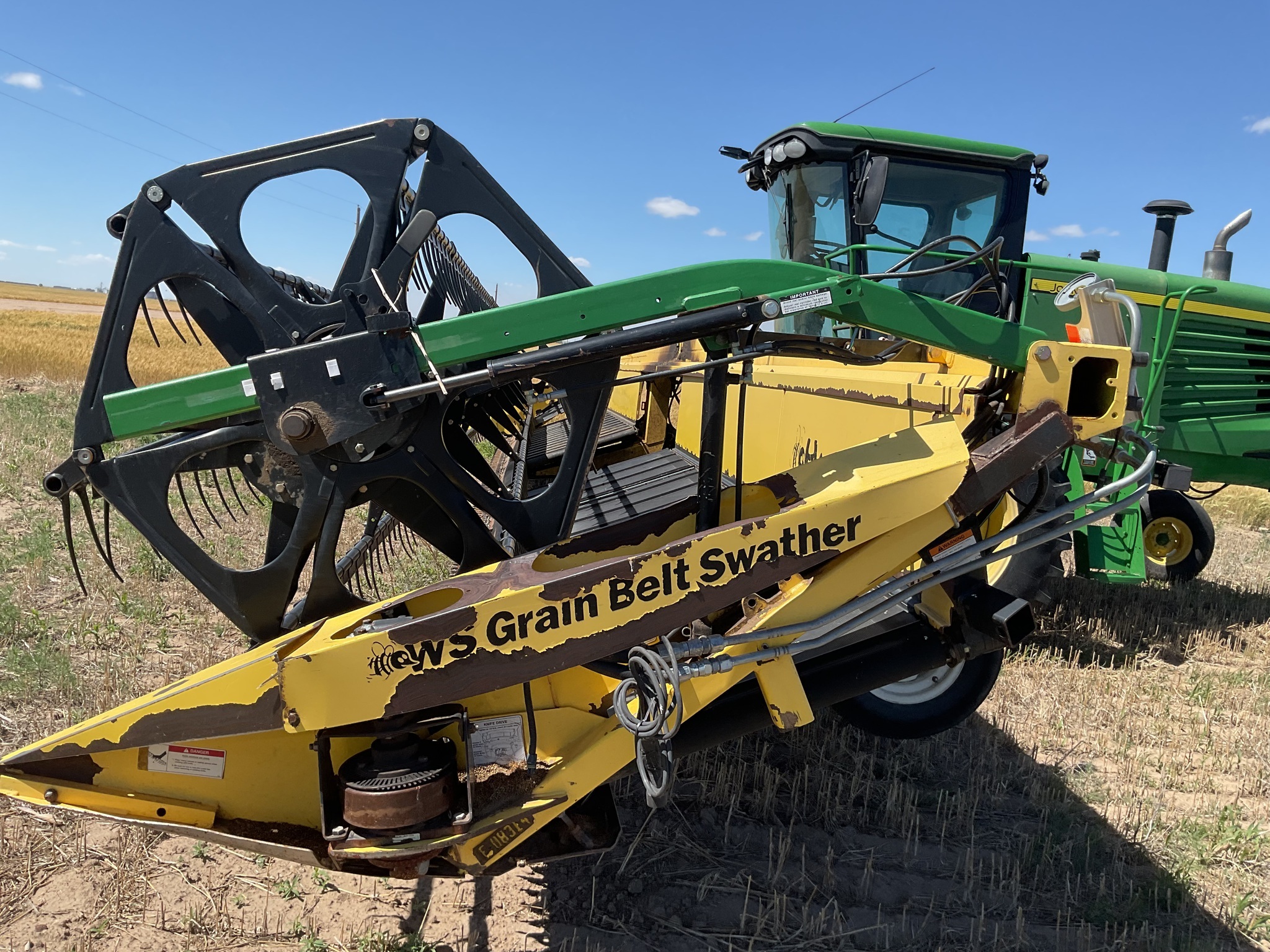 2010 John Deere A400 Self-Propelled Windrowers and Swather