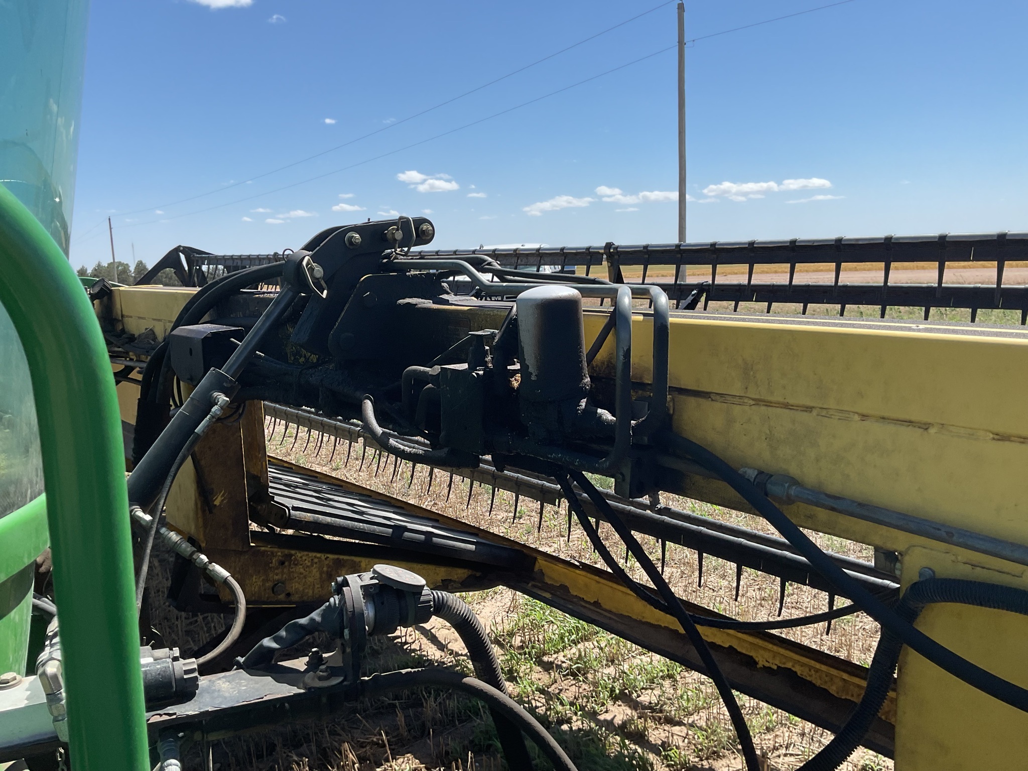2010 John Deere A400 Self-Propelled Windrowers and Swather