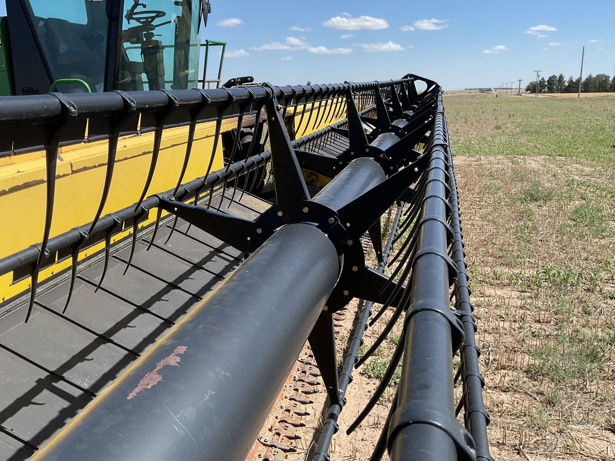 2010 John Deere A400 Self-Propelled Windrowers and Swather