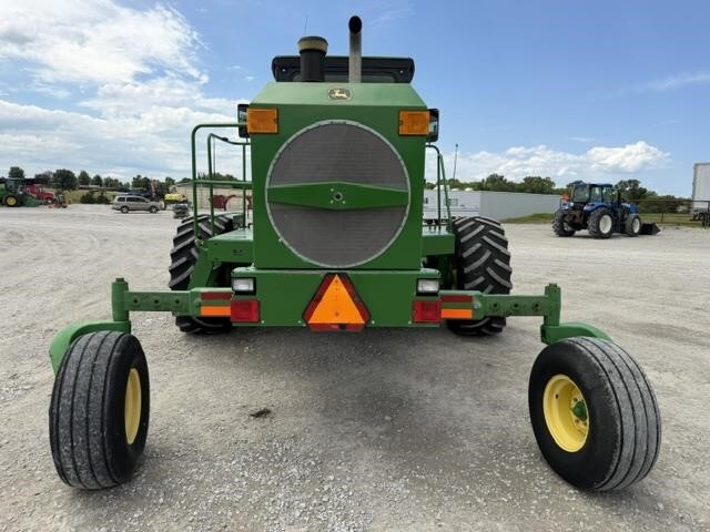  John Deere 4995 Self-Propelled Windrowers and Swather