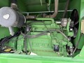  John Deere 4995 Self-Propelled Windrowers and Swather