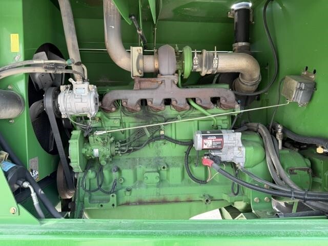 John Deere 4995 Self-Propelled Windrowers and Swather