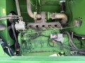  John Deere 4995 Self-Propelled Windrowers and Swather
