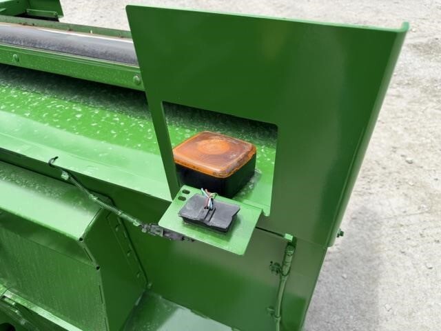  John Deere 4995 Self-Propelled Windrowers and Swather