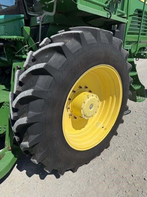  John Deere W235 Self-Propelled Windrowers and Swather