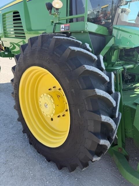  John Deere W235 Self-Propelled Windrowers and Swather