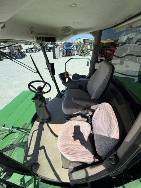  John Deere W235 Self-Propelled Windrowers and Swather