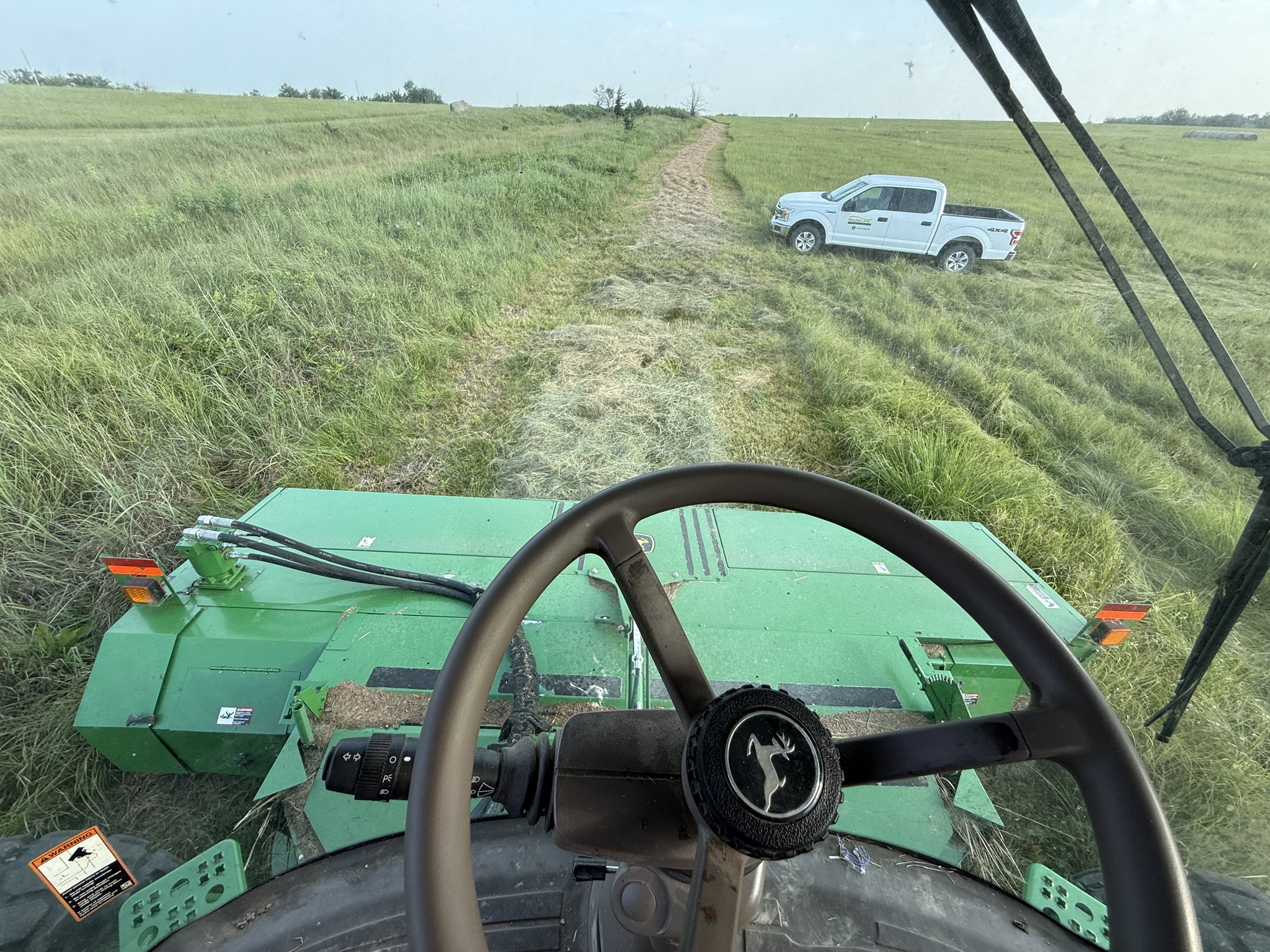2014 John Deere W235 Self-Propelled Windrowers and Swather