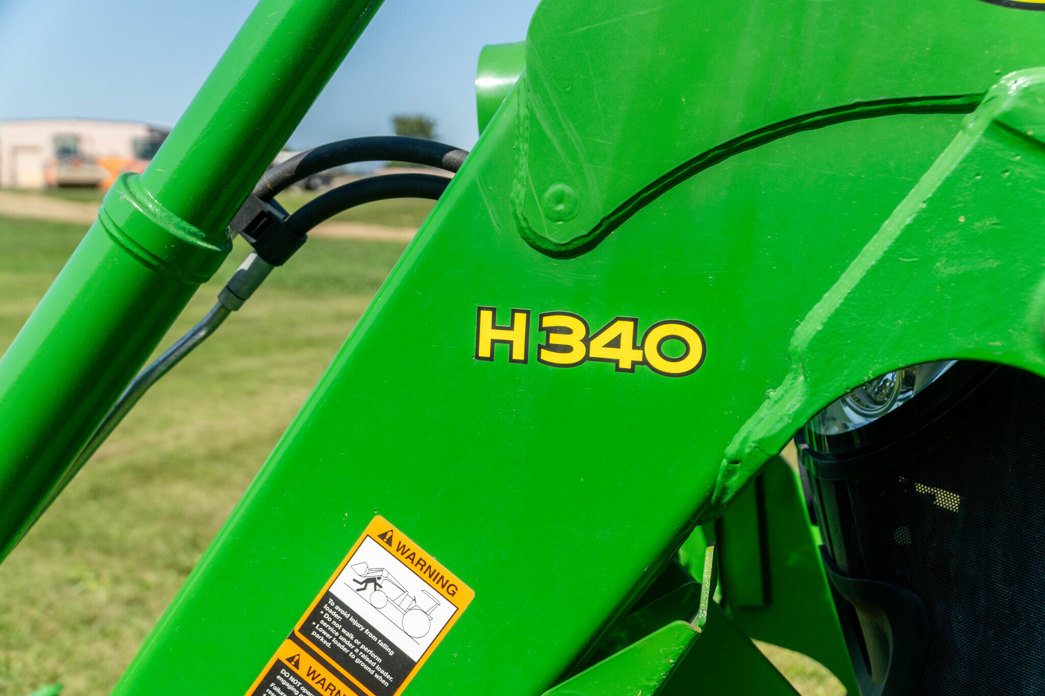 2013 John Deere 6115R Tractor