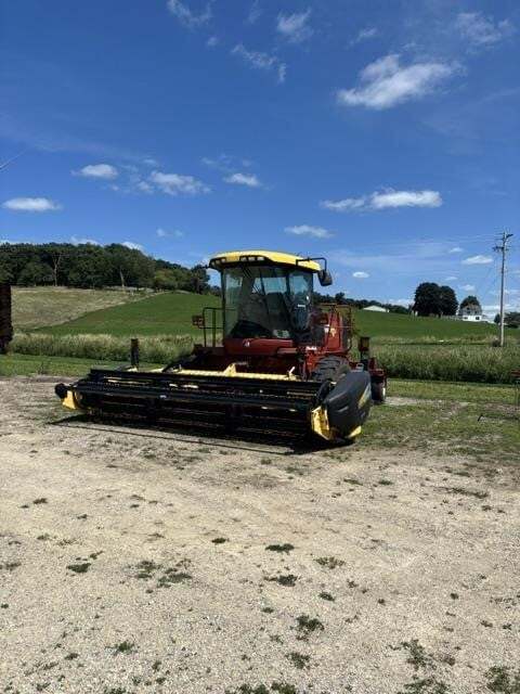 2010 New Holland H8040 Self-Propelled Windrowers and Swather