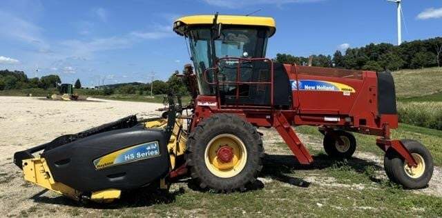 2010 New Holland H8040 Self-Propelled Windrowers and Swather