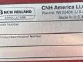 2010 New Holland H8040 Self-Propelled Windrowers and Swather