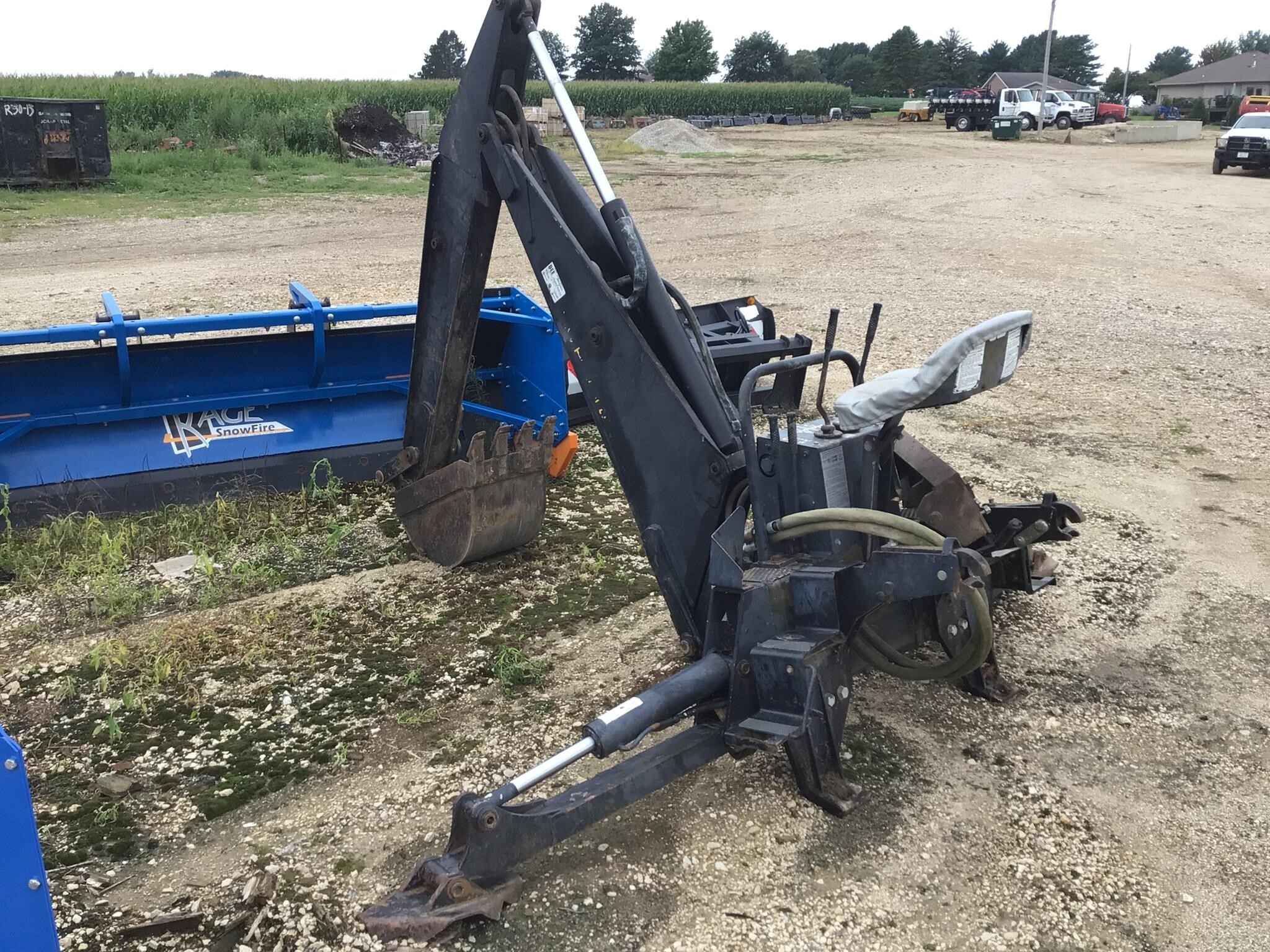 1997 New Holland BH124 Loader and Skid Steer Attachment