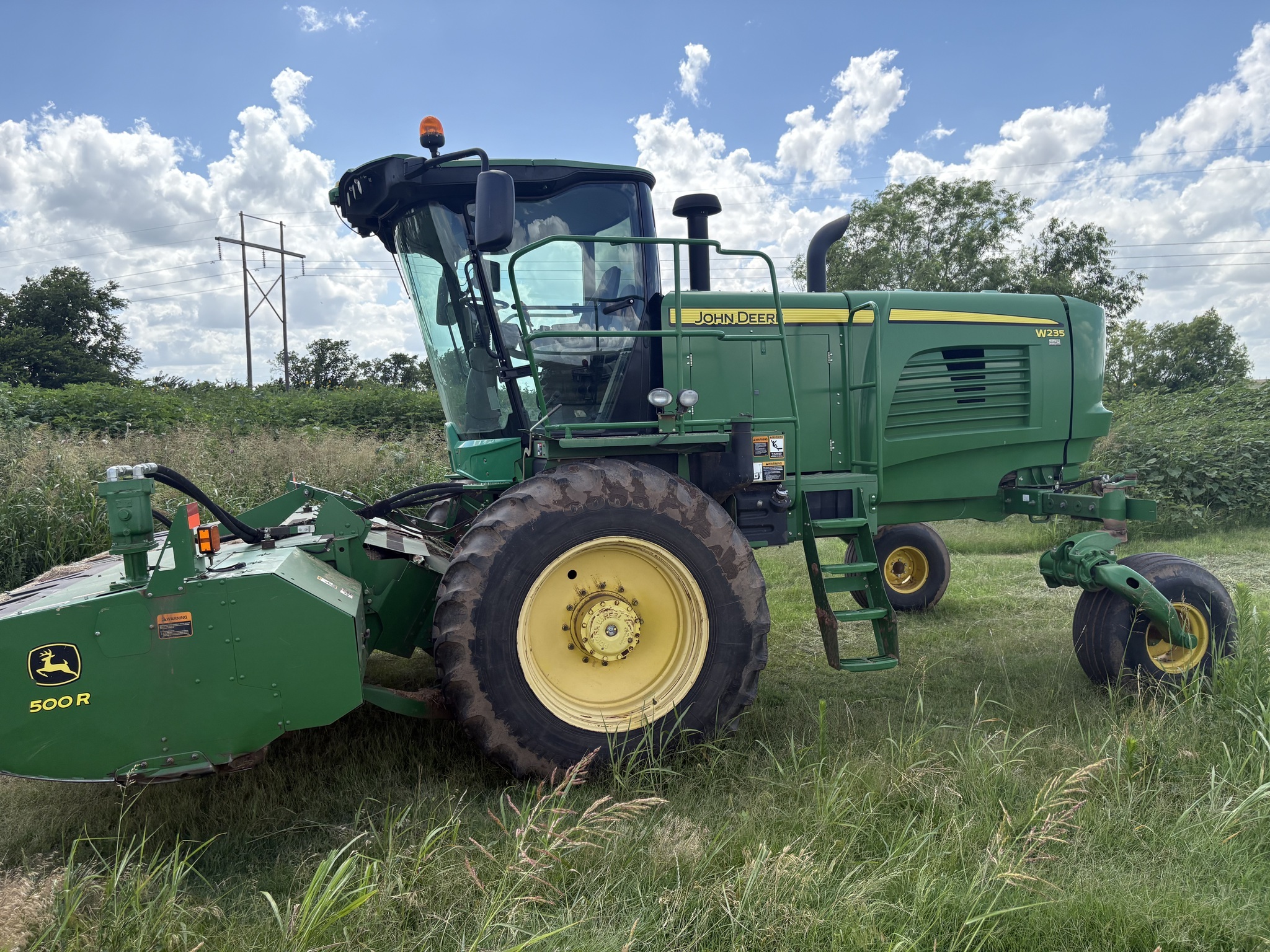 2014 John Deere W235 Self-Propelled Windrowers and Swather