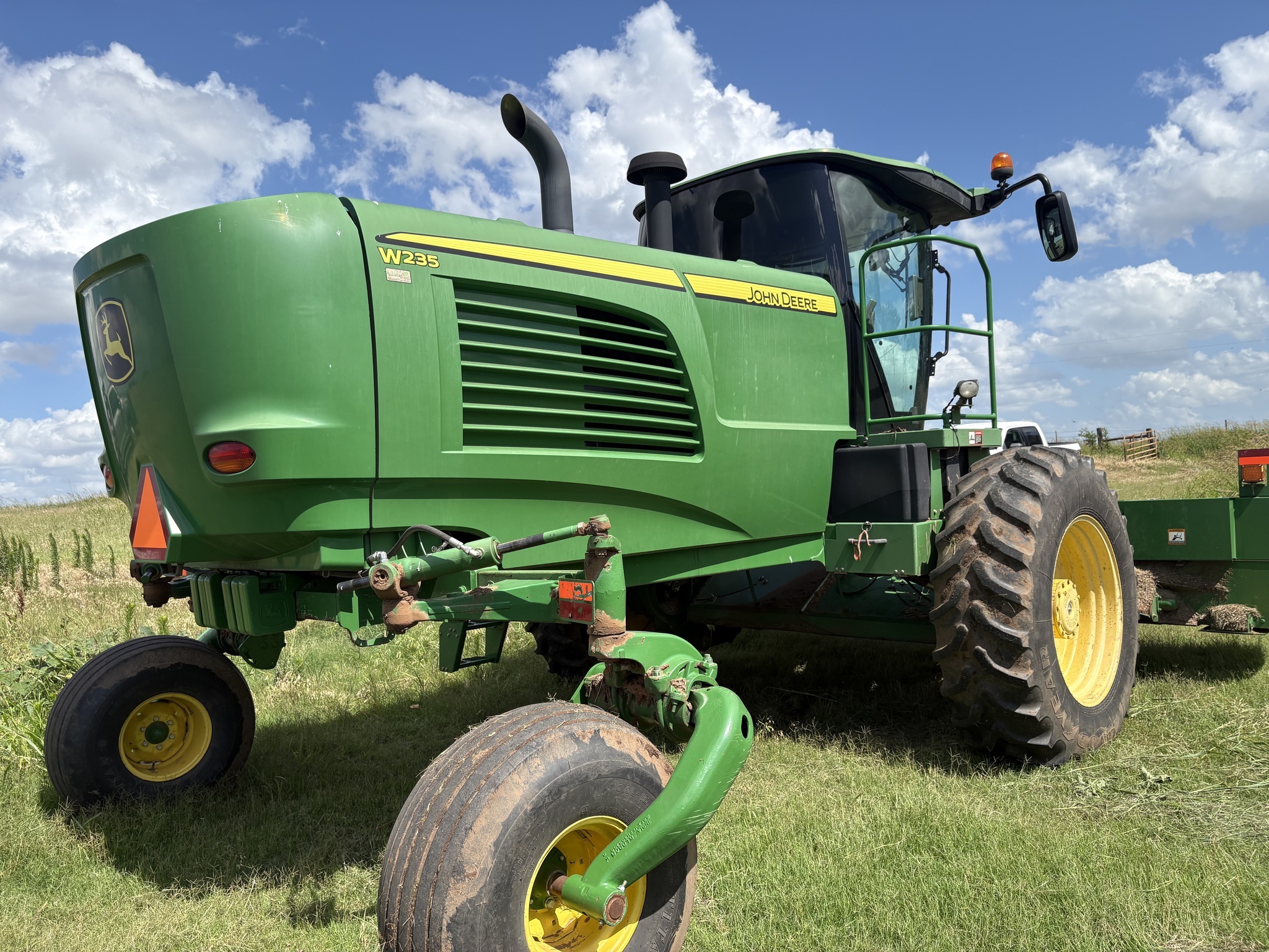 2014 John Deere W235 Self-Propelled Windrowers and Swather