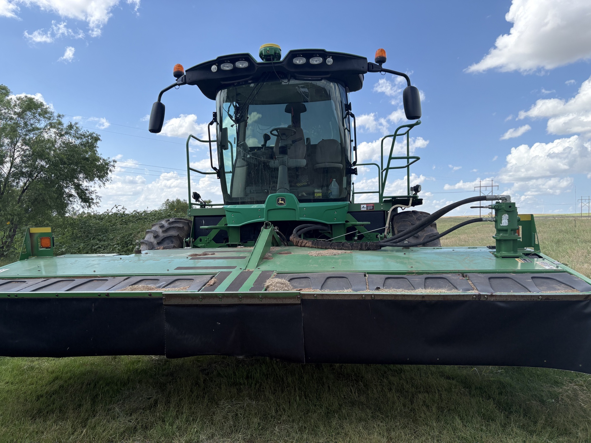 2014 John Deere W235 Self-Propelled Windrowers and Swather