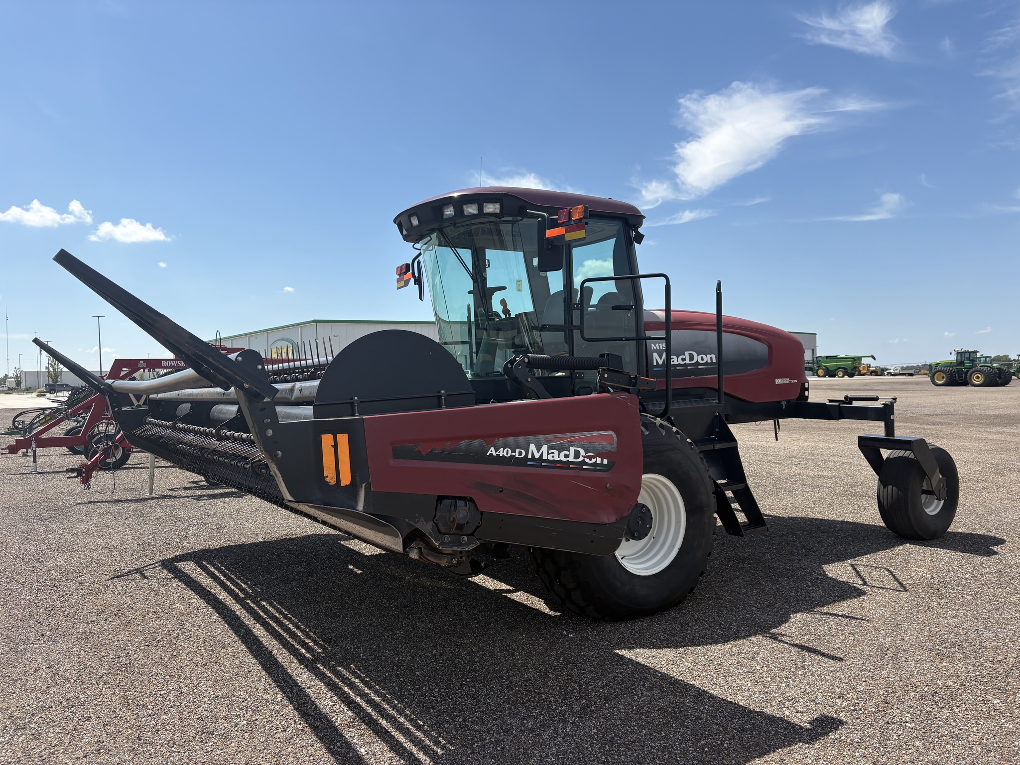 2010 MacDon M150 Self-Propelled Windrowers and Swather