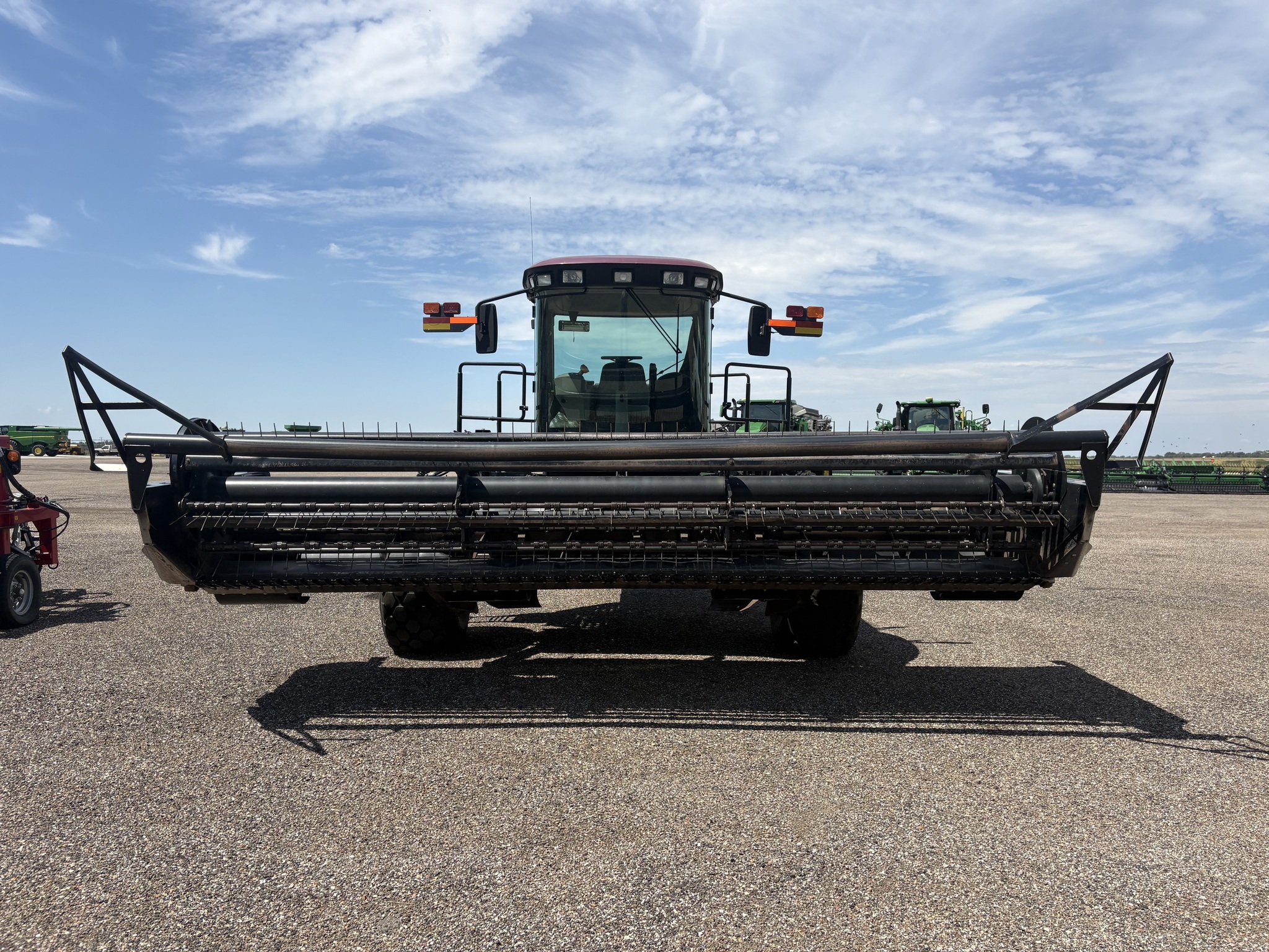 2010 MacDon M150 Self-Propelled Windrowers and Swather
