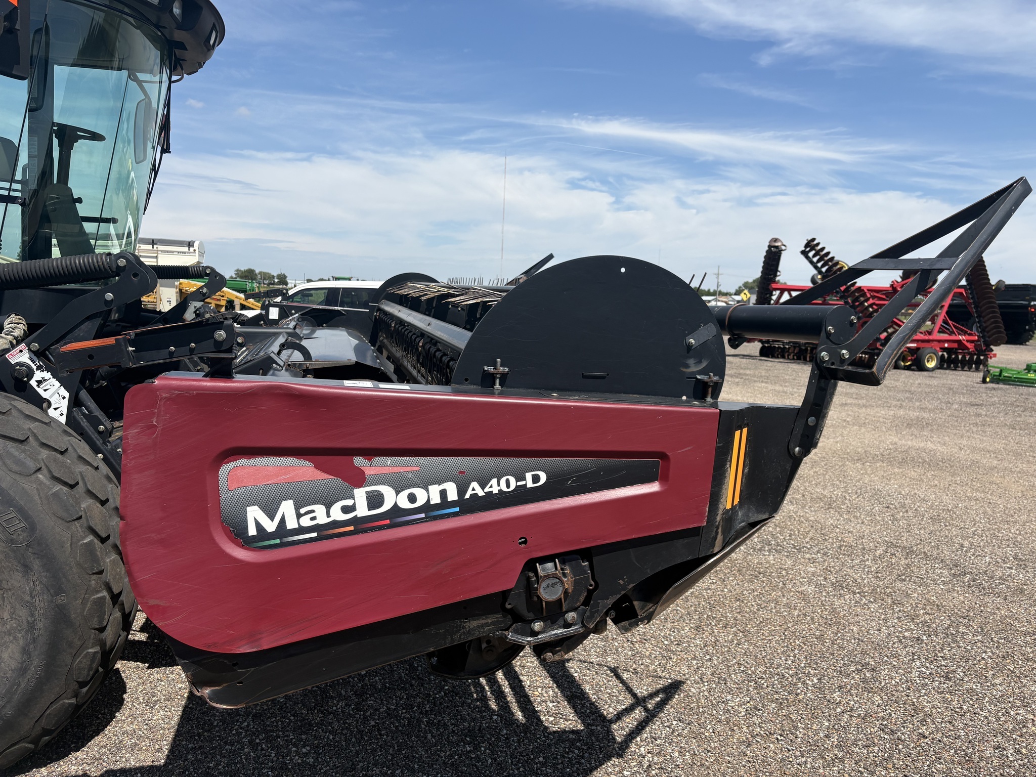2010 MacDon M150 Self-Propelled Windrowers and Swather
