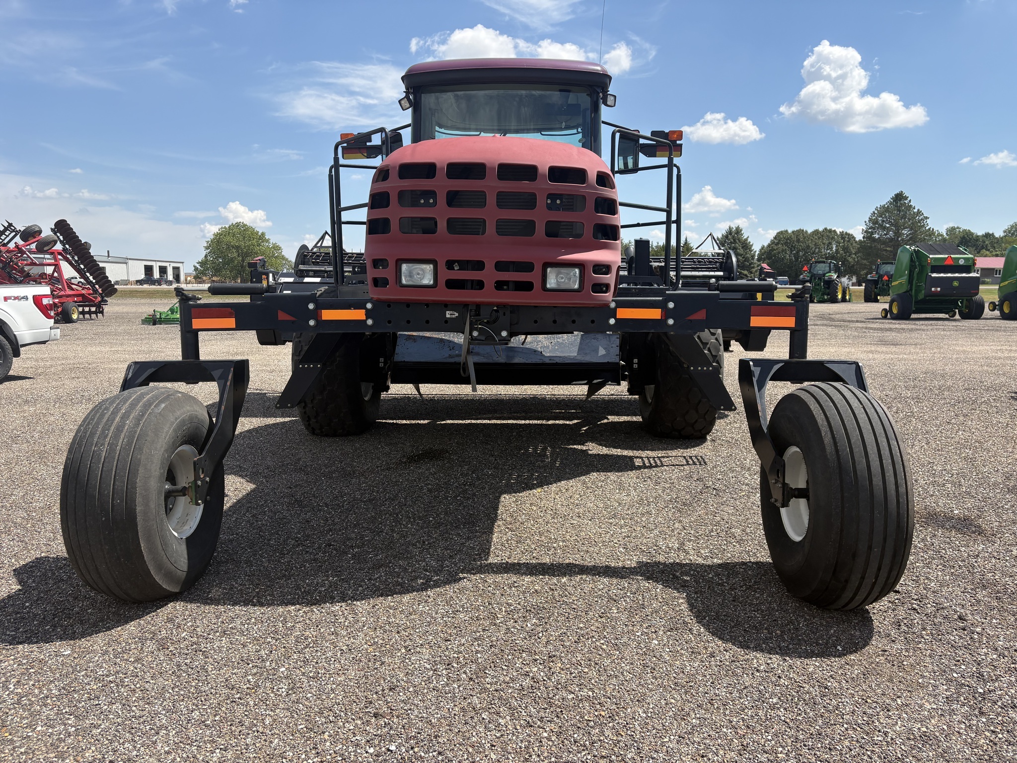2010 MacDon M150 Self-Propelled Windrowers and Swather