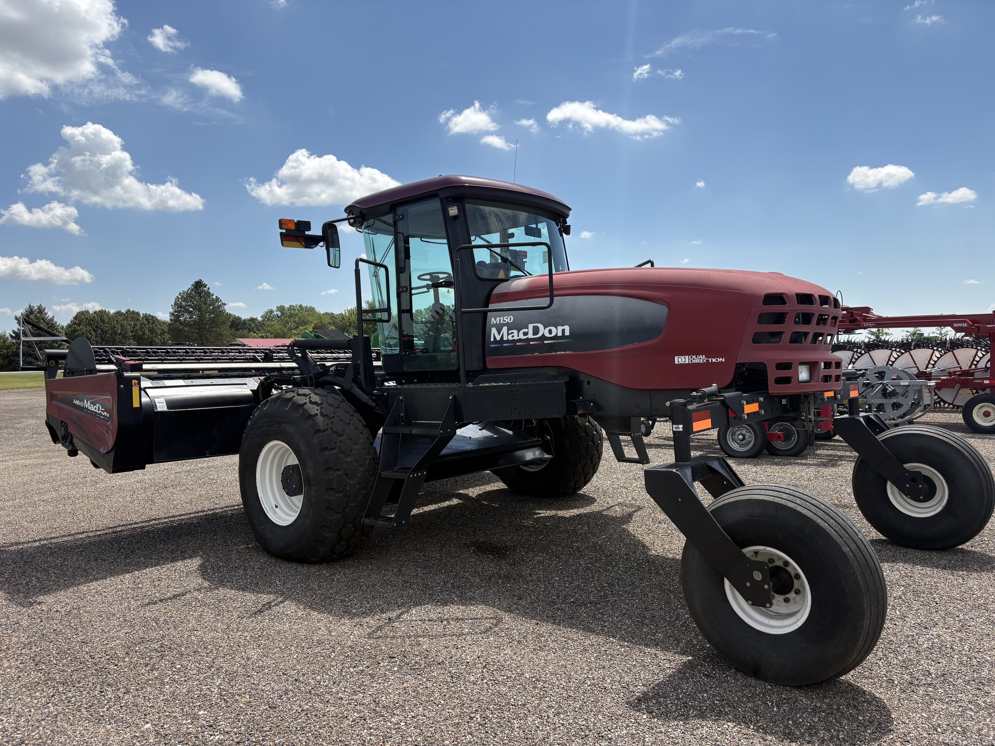 2010 MacDon M150 Self-Propelled Windrowers and Swather