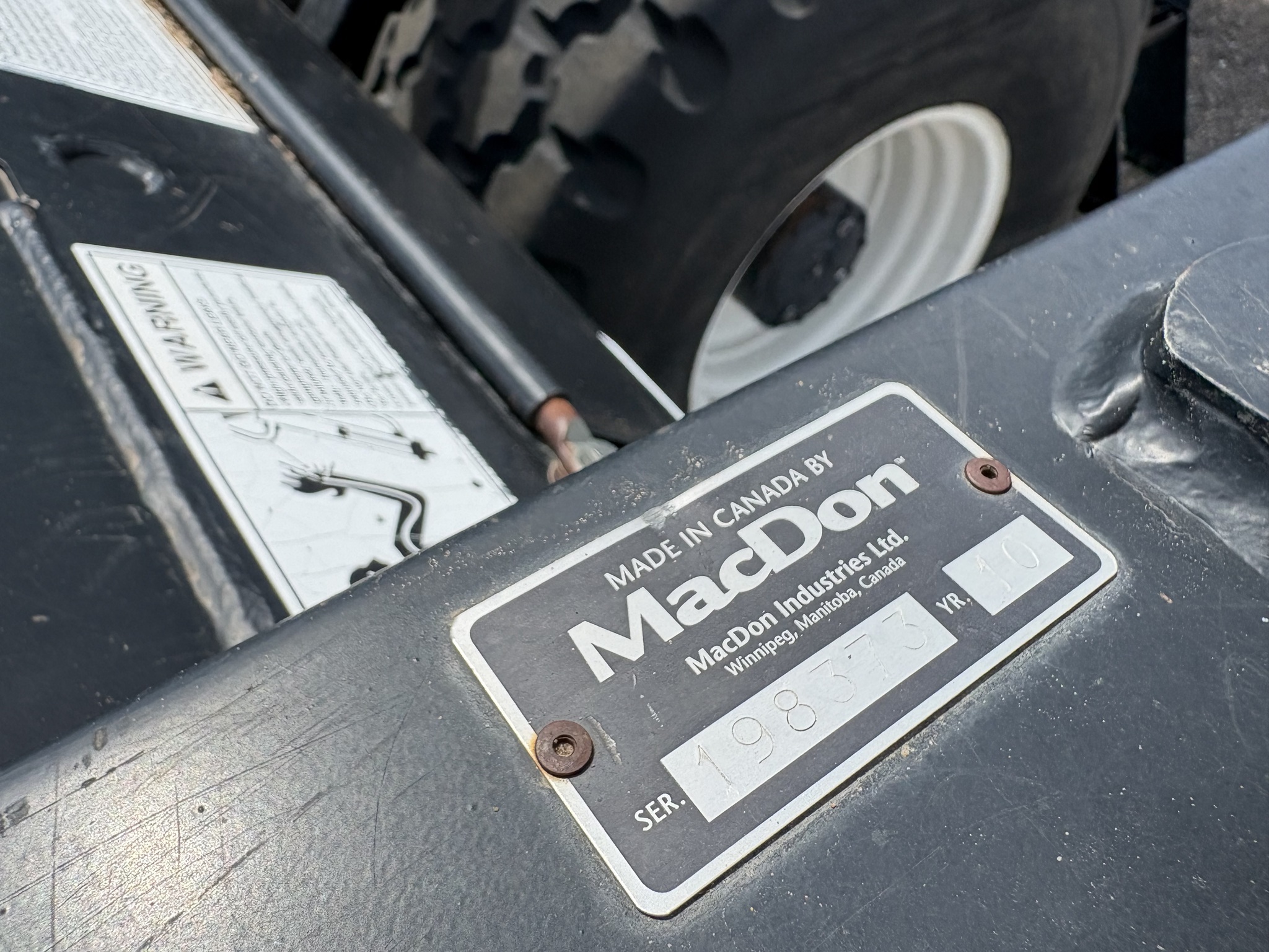 2010 MacDon M150 Self-Propelled Windrowers and Swather