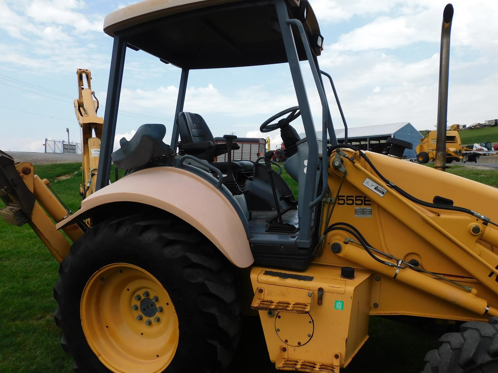 1999 New Holland 555E Backhoe