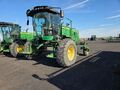 2014 John Deere W235 Self-Propelled Windrowers and Swather